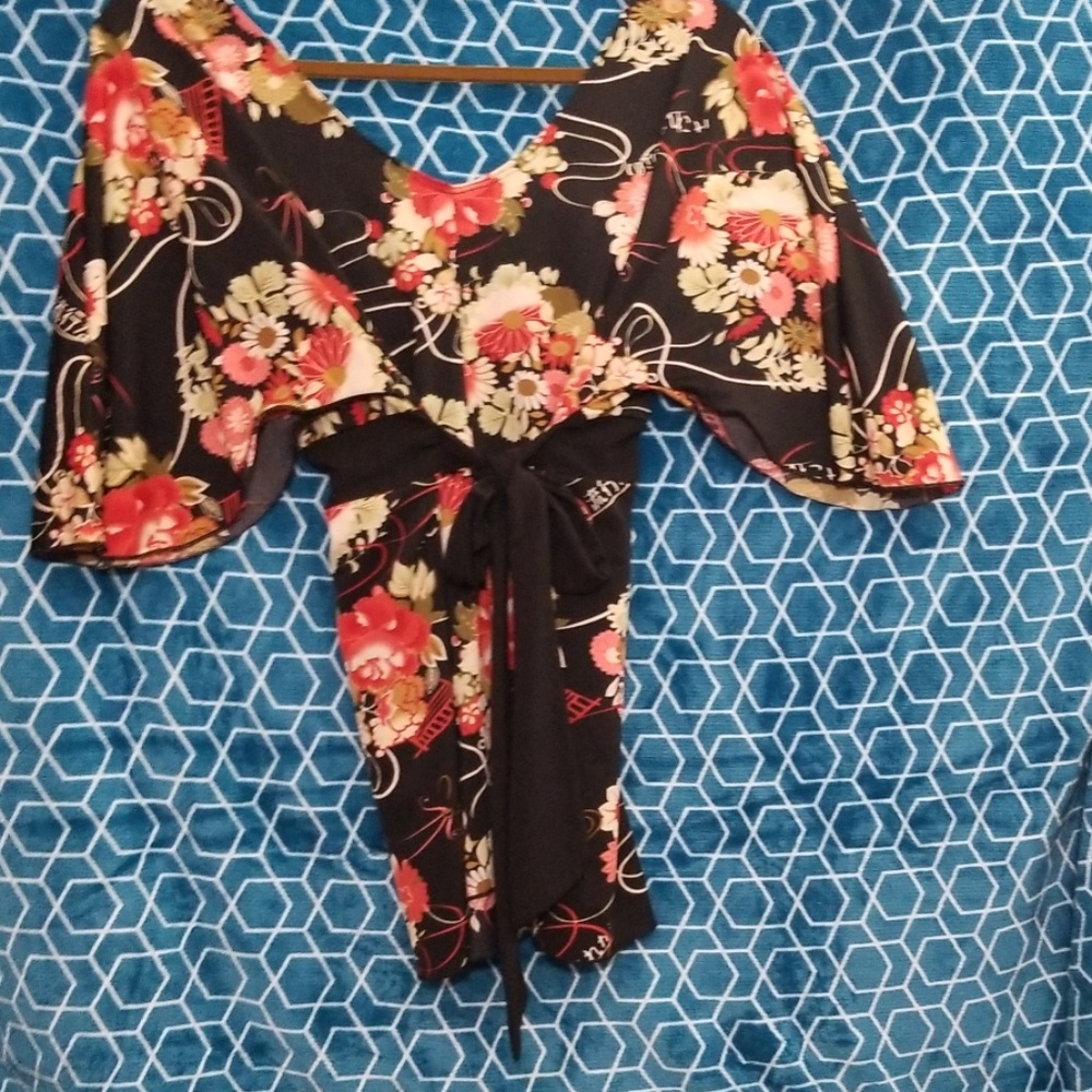 Kimono like, empire waist, black tie in back, too